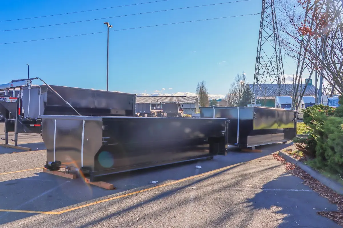 Roll-off dumpster ready for waste disposal at job site for 2 Yard Dumpster Rental in Russellville